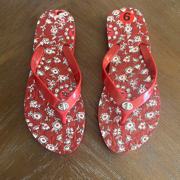 Coach Shoes - Coach Abbigail Red Floral Pattern Flip Flops with Silver Turnlock Logo Sz 6
